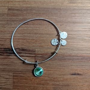Alex and Ani adjustable bangle with peridot stone